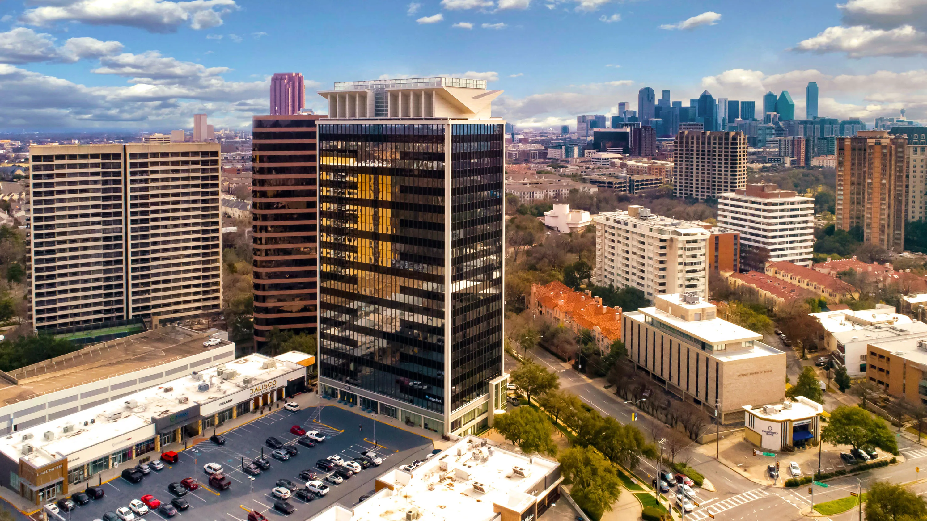 exterior drone shot of Turtle Creek Village office tower